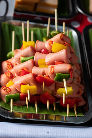 Bologna Spicy Pork and sweet pepper with a small wood.の写真素材