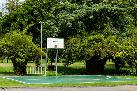 Outdoor basketball court floor polishing smooth and painted well protection in the parkの写真素材