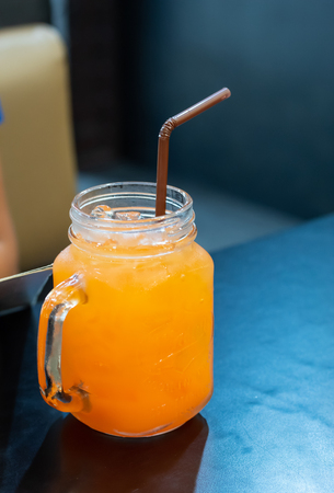 Punch juice in the glass on the table.の写真素材