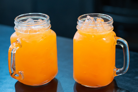 Punch juice in the glass on the table.の写真素材