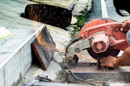 The workers are cutting steel. With steel cutting tools.の写真素材