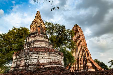 The old tower built of bricks is damaged at Worachet temple in Ayutthaya ,Thailand.の写真素材