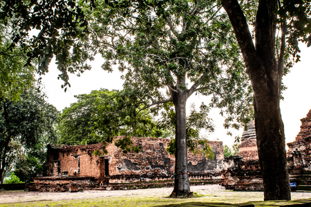 The old tower built of bricks is damaged at Worachet temple in Ayutthaya ,Thailand.の写真素材