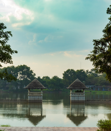 Concrete pavilion at the pond in the park.の写真素材