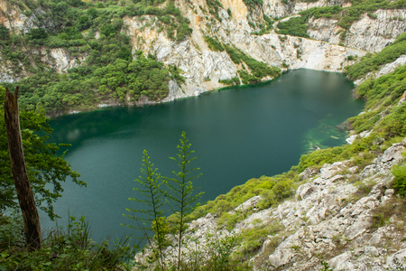Pond with green water and deep as a tourist destination. Grand Canyon of Thailandの写真素材