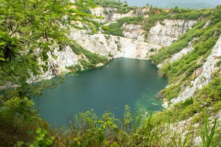 Pond with green water and deep as a tourist destination. Grand Canyon of Thailandの写真素材