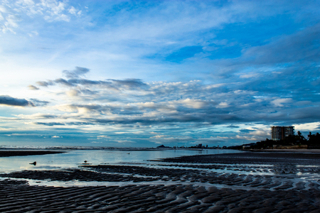 The morning sun light in the sea and cityscape of Hua Hin beaches , Thailand.の写真素材