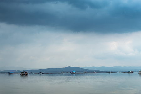 The raft floating fish farming and sky in Krasiew dam ,Supanburi Thailand.の写真素材