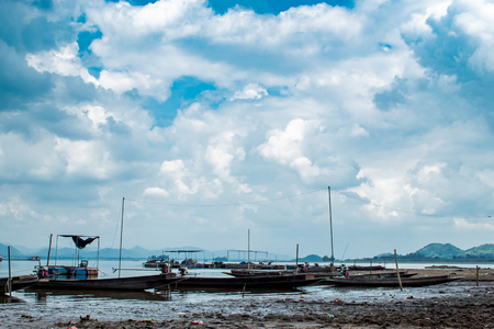 Small fishing boats in damの写真素材