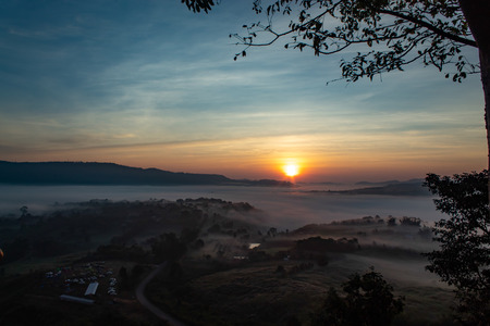 Fog and sun Morning after mountain.の写真素材