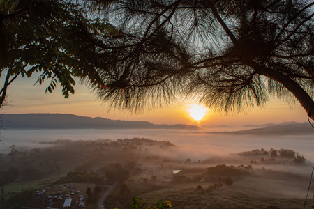 Fog and sun Morning after mountain.の写真素材