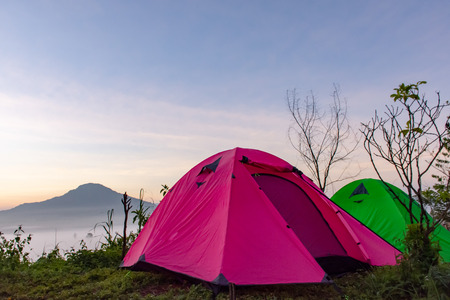 Tent on the mountain The background Fog and sun Morning after mountain.の写真素材