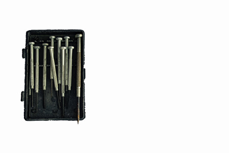 A small screwdriver in the box that is defective on a white background.