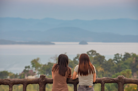 The girl standing at the view Srinakarin Dam at Huay Mae khamin waterfall National Park ,Kanchana...
