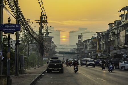 The early morning sunlight shining on buildings and the cars on the road at Bangyai City of Nonthaburi in Thailand. January 14, 2019のeditorial素材