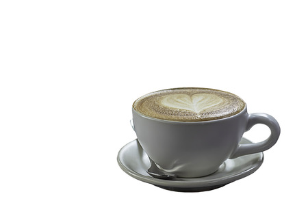 Hot coffee Espresso topped with a heart-shaped milk in white glass on a white background with clipping path.の写真素材