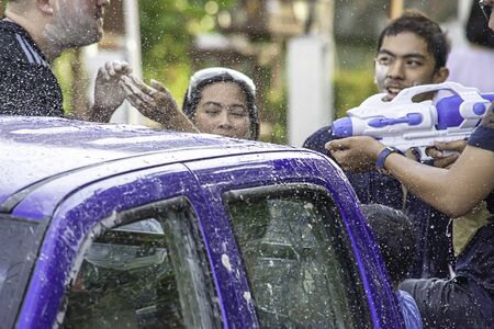Tourists on the car play water in Songkran festival or Thai new year at Bang kruai, Nonthaburi, April 15, 2019のeditorial素材
