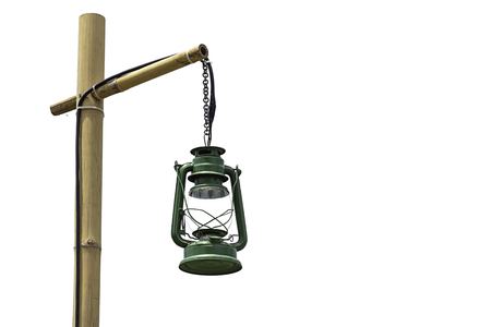 Isolated Green Lantern hanging on bamboo poles on a white backgroundの写真素材