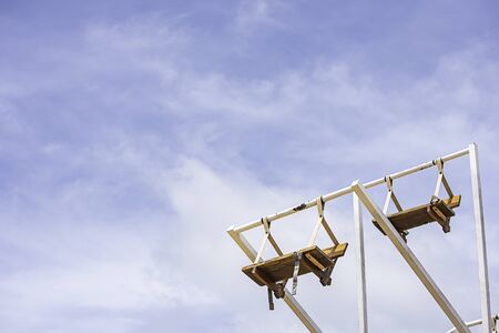 The wooden Ferris wheel and bright blue sky at Windtime Khao kho , Phetchabun in Thailand.