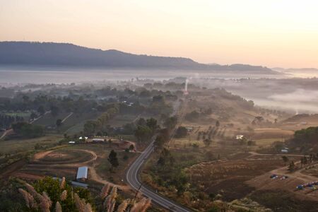 Morning mist covered by trees at Khao Takhian Ngo Phetchabun in Thailand.