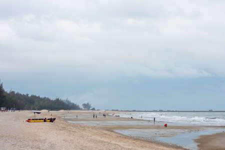 Tourists walk on the beach Background sea at Hua Hin Beach, Prachuap Khiri Khan in Thailand. March 15, 2020のeditorial素材