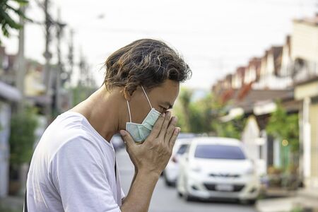 man wear a mask to prevent dust in Bangkok ,Thailand.の写真素材