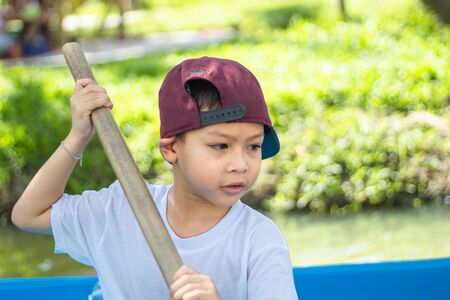 The boy boating in the park.の写真素材