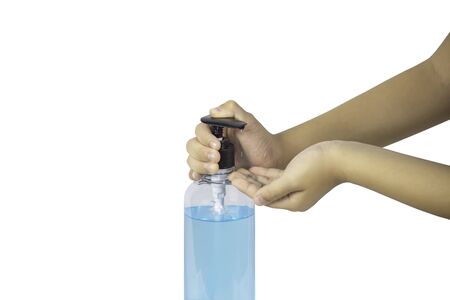 The hand that is pressing the pump into the alcohol gelの写真素材