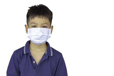 Asian boy wearing a mask on a white background   .の写真素材