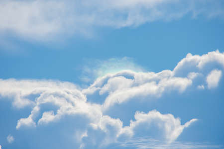 The beauty of the sky with clouds and the sun.の写真素材