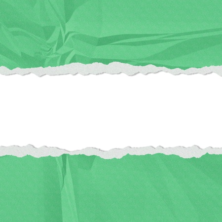 Hole in the green paper with torn sides paper textureの写真素材