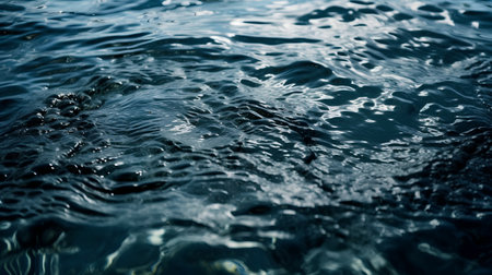 Water surface close-up with ripples and waves in the backgroundの素材