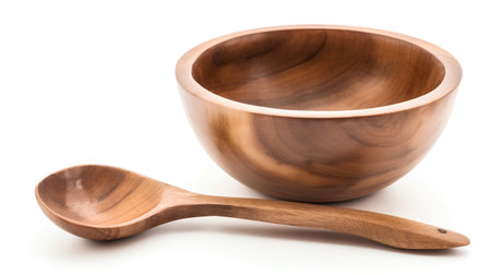 Wooden bowl and spoon isolated on white background close up. Clipping Pathの素材