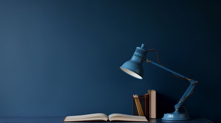 Blue wall with a lamp, books and a book. 3d renderの素材