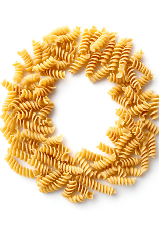 Uncooked fusilli pasta spiral shape frame isolated on white background cutoutの素材