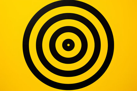 Black target icon on yellow background. 3d illustration. Business conceptの素材