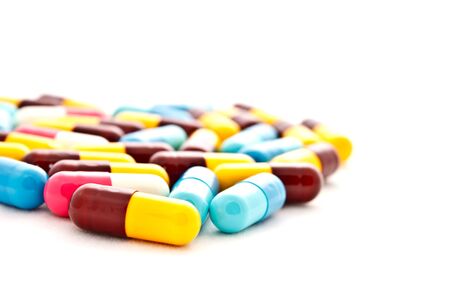 coloful pills on white background