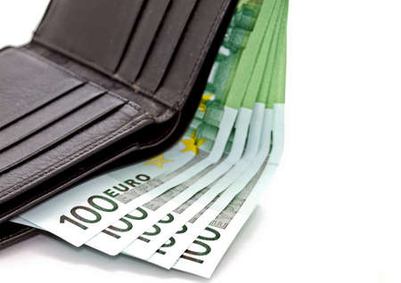 Euro banknote in black wallet in white backgroundの写真素材