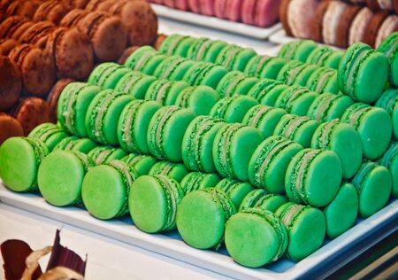 green macaroons for sale in dessert shopの写真素材