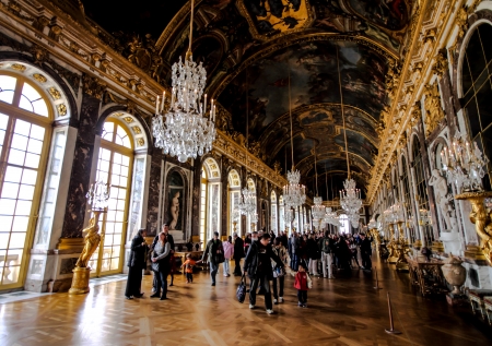 visitors in the hall of mirror inside Versailles palace, Franceのeditorial素材