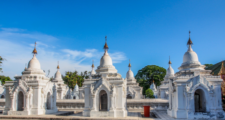 white stupa in Kuthodaw temple, Mandalay, Myanmarの写真素材