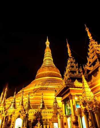 the famous Shwedagon pagoda in Yangon at night, Myanmarのeditorial素材