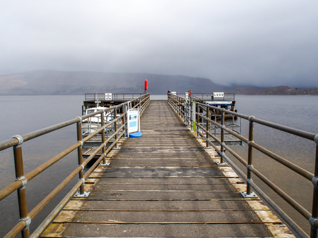 beautiful pier at Luss village, Scotland, UKの写真素材