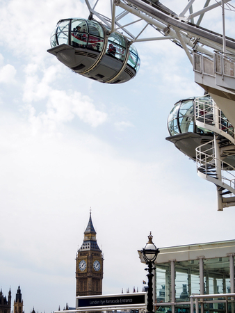 London Eyes with Big Ben clock tower, London, UK
