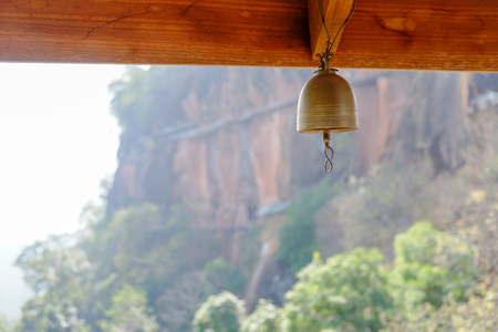 bell with mountain backgroundの写真素材