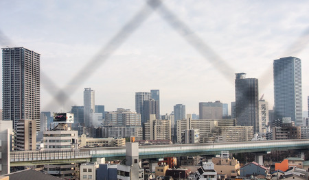 grid on window with city background