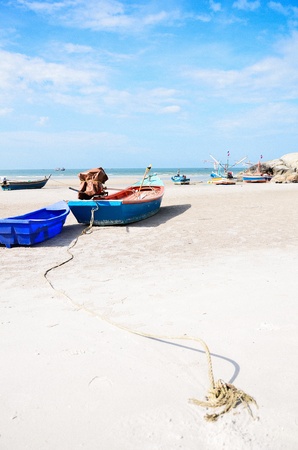 Blue fishing boat on the beachの写真素材