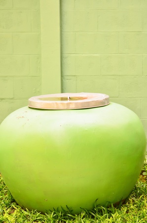 Big green jar with green wallの写真素材