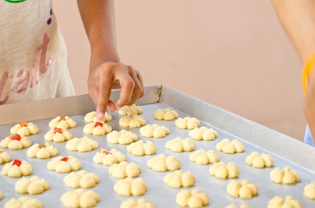 the process of baking cookies at homeの写真素材