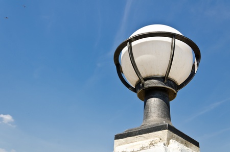 White lamp with blue sky